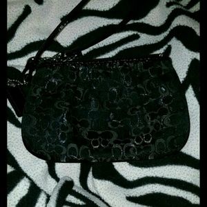 Black and sliver coach clutch