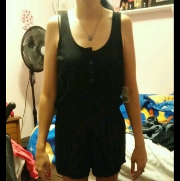 Black romper with buttons in the front