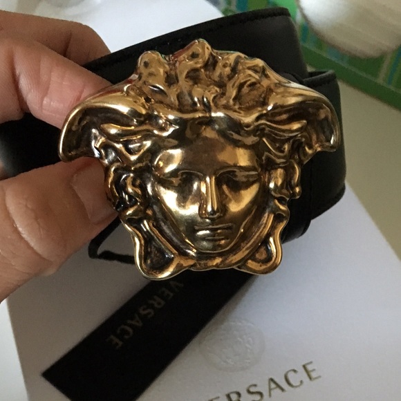 Black Versace belt with medusa head chuckle