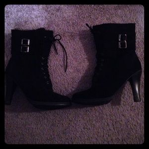 Black high heeled suede boots