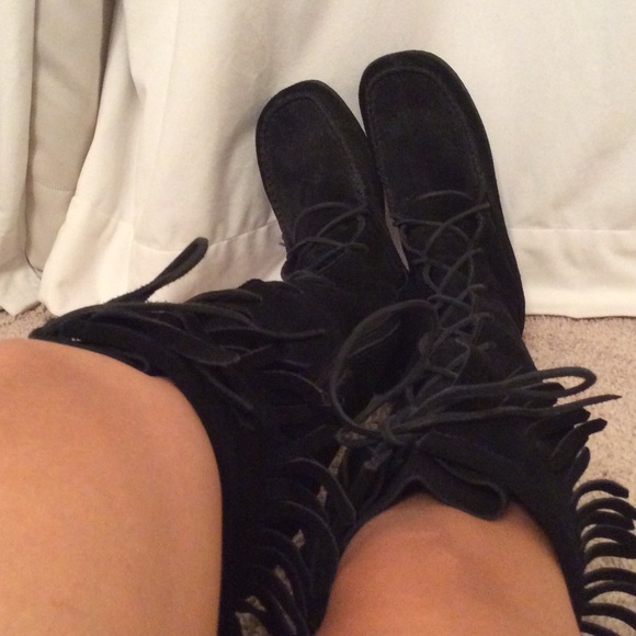 Black Delia's lace-up boots with fringe