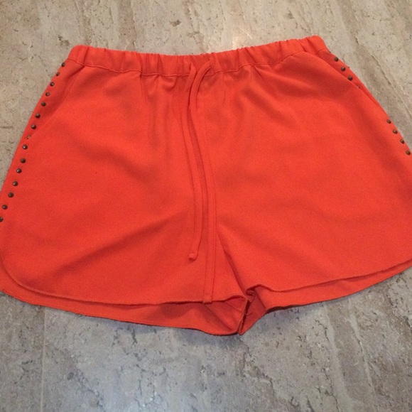 High waisted orange shorts