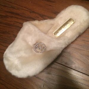 Michael kors size 8 ivory slippers with bling logo