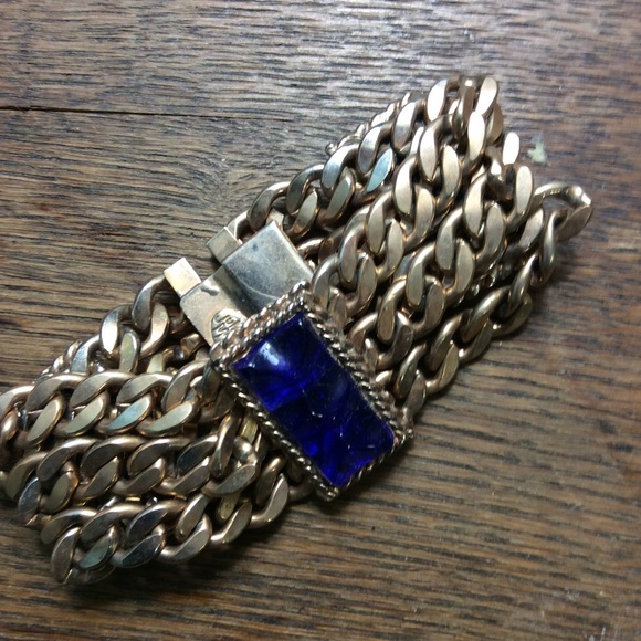 Gold bracelet with blue stones