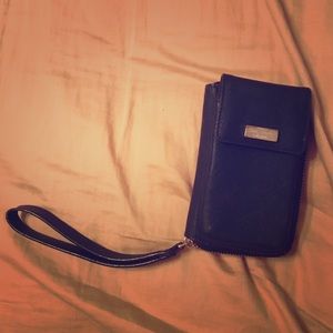 Lightly used  Kate spade iPhone 5/5s wristwallet