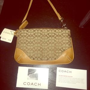 Coach signature edition wristlet