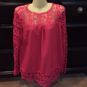 Pink shirt with lace neck sleeves & around bottom