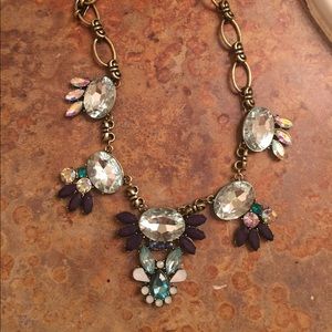 Glam statement necklace and gold v ring