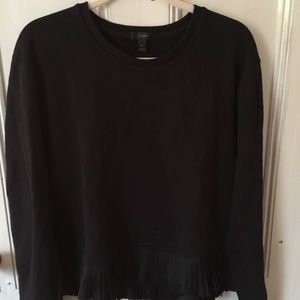 JCrew ruffle bottom sweater.