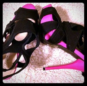Like new pink and black spike heels