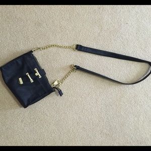 Black and gold Steve Madden cross body