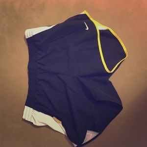 Black and yellow Nike Running Shorts