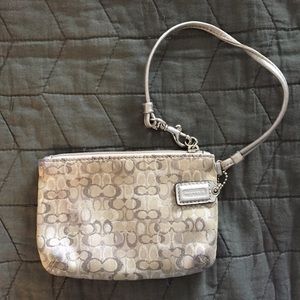 Coach corner zip wristlet in signature fabric