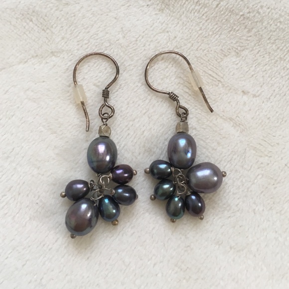 Purple/green toned faux pearl drop earrings.