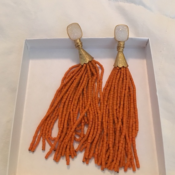 Orange tassel earrings with white Druze post