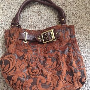 Brown tapestry hobo bag
