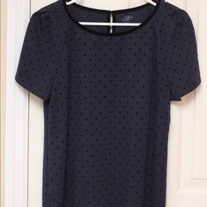 Deep plum top with black velvet polka dots