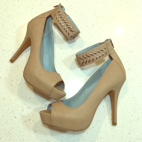 Wedge platform pumps by Miranda Lambert