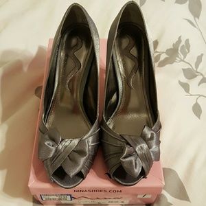 Platinum peep toe heels