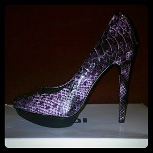 Purple python patterned pumps