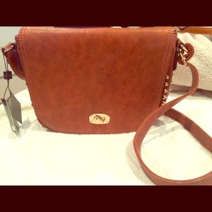 Rust colored MMS Design purse.