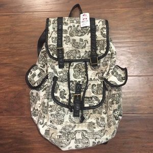 Black and Tan elephant backpack from Claire's