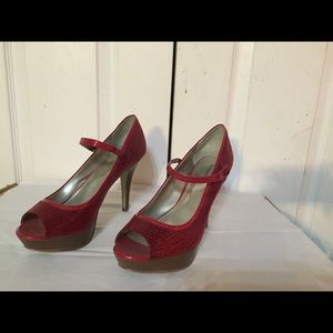 Red platform peep toe heels