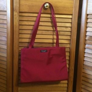 Kate Spade Sam handbag in red.