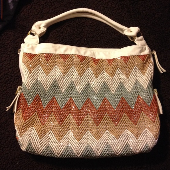Huge multi-colored chevron designed purse.