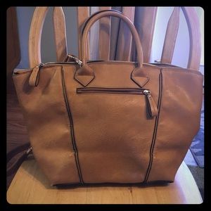 Tan satchel with gold accents
