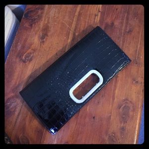 Black snake skin print clutch