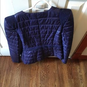 Runs small fits a woman/teenager jacket size 6