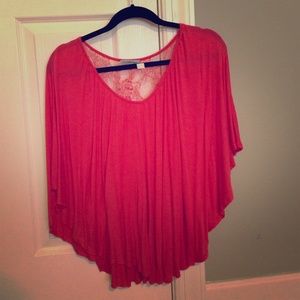 Flowy coral top with beautiful lace back design