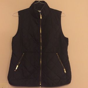 Black quilted puffy vest