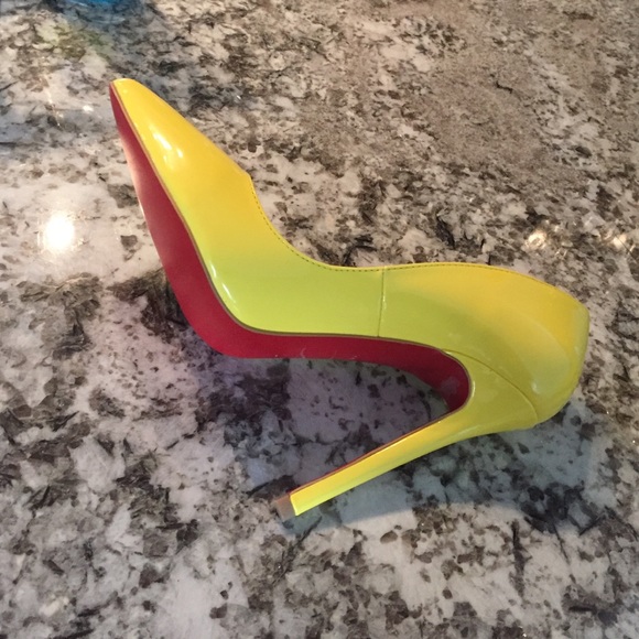 Yellow pumps with red soles - size 9