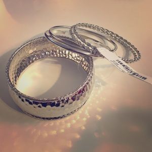 5 silver bangles from Charming Charlie w/ the tag