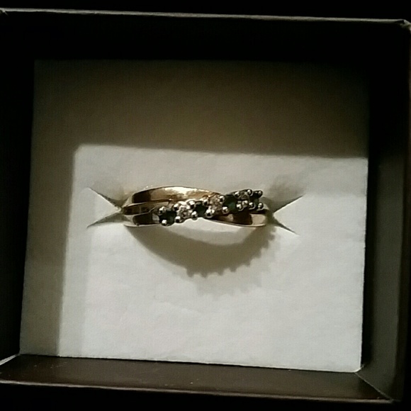 gold ring with diamonds / emeralds
