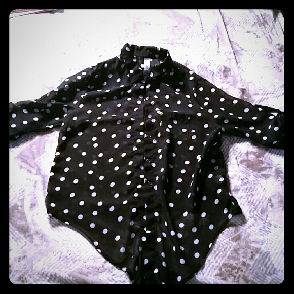Navy blue polka dot blouse.