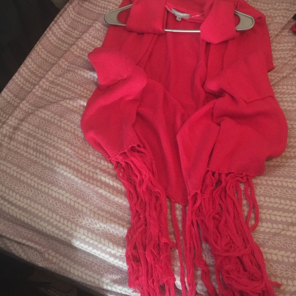 Long pink sweater vest