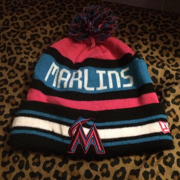 Pink blue white and black Marlins Pom Beanie .