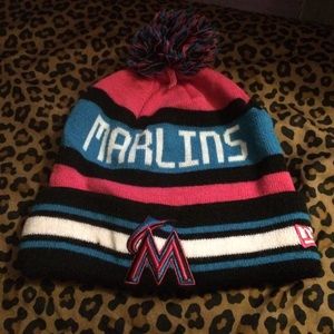 Pink blue white and black Marlins Pom Beanie .
