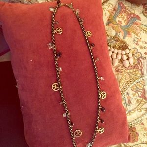 Black and gold peace sign necklace
