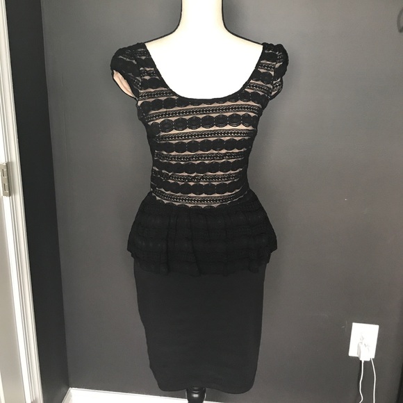 Black Peplum Dress with Open Back - Picture 1 of 5