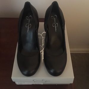 Black leather wedge shoes