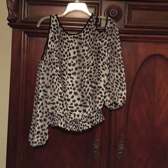Large sheer peep shoulder animal print blouse