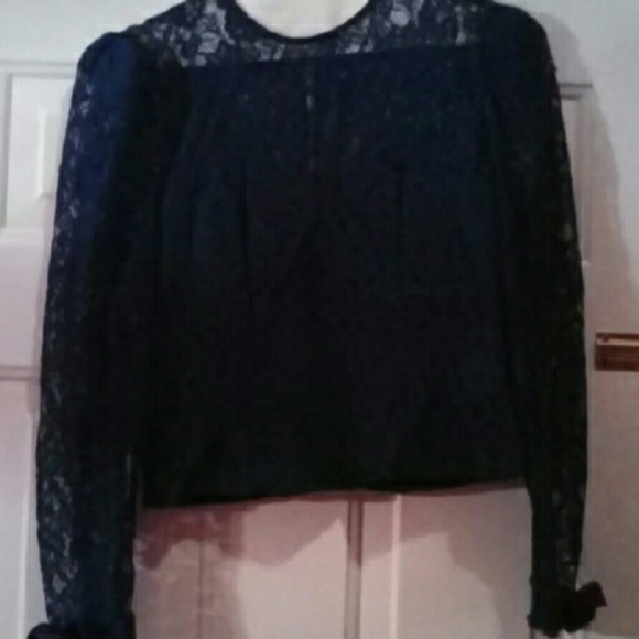 1980s vintage lace top and taffeta skirt.