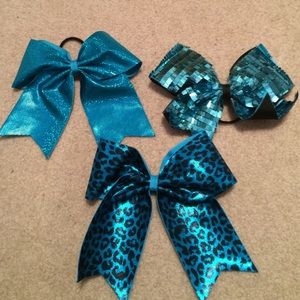 Teal cheer bows