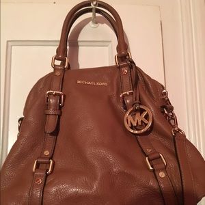 Cognac brown Authentic Michael Kors bag.