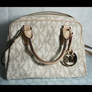 Michael Kors satchel with cross body strap.