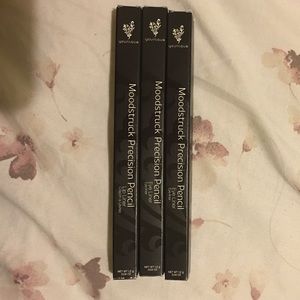 Black and white eye liner and burgundy lip liner